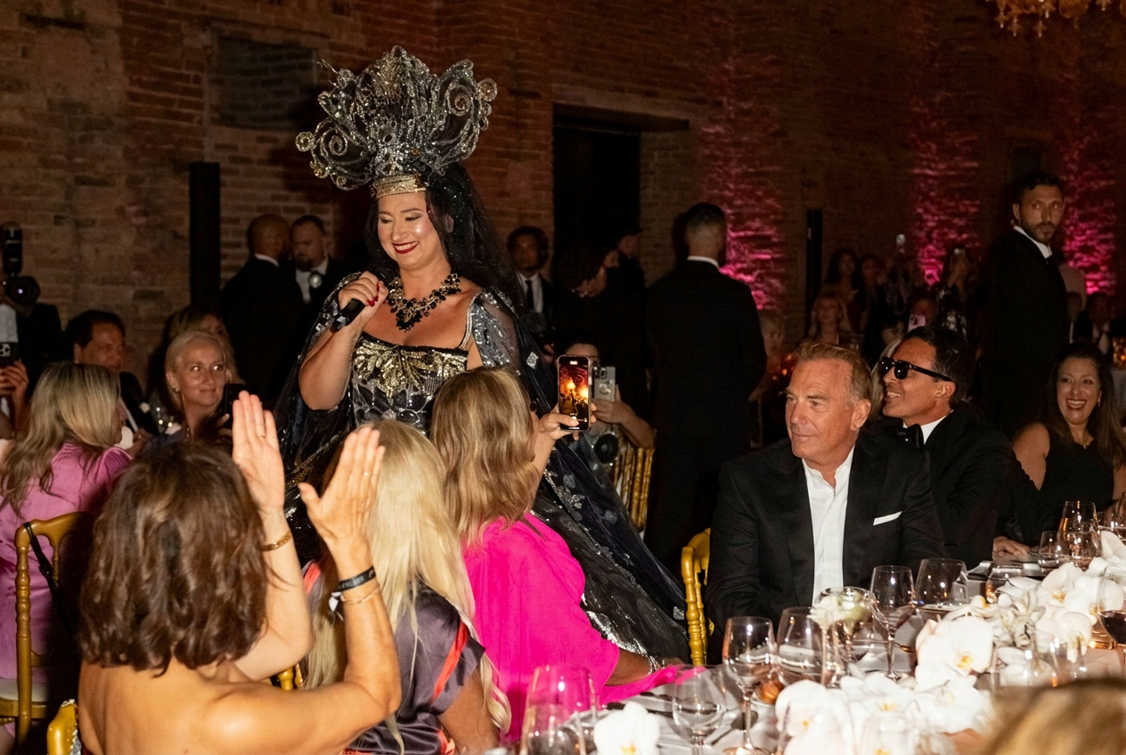 Anna Sanachina singing among the guests at the Better World Fund Gala at Hotel Cipriani, A Belmond Hotel, during the 81st Venice Film Festival.